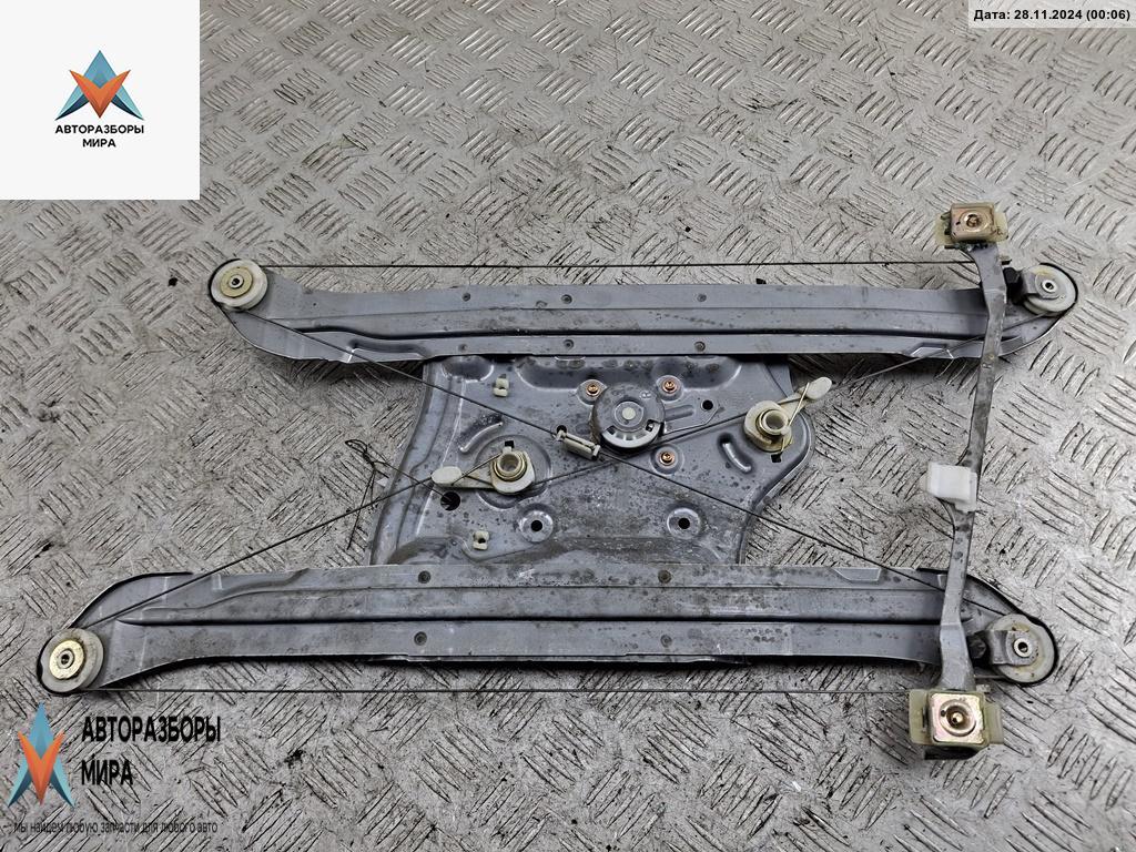 стеклоподъемник электрический передний правый Mitsubishi Grandis 1 поколение 2004, 2.4 л., бензин, МКПП, чёрный, минивэн - фото №1