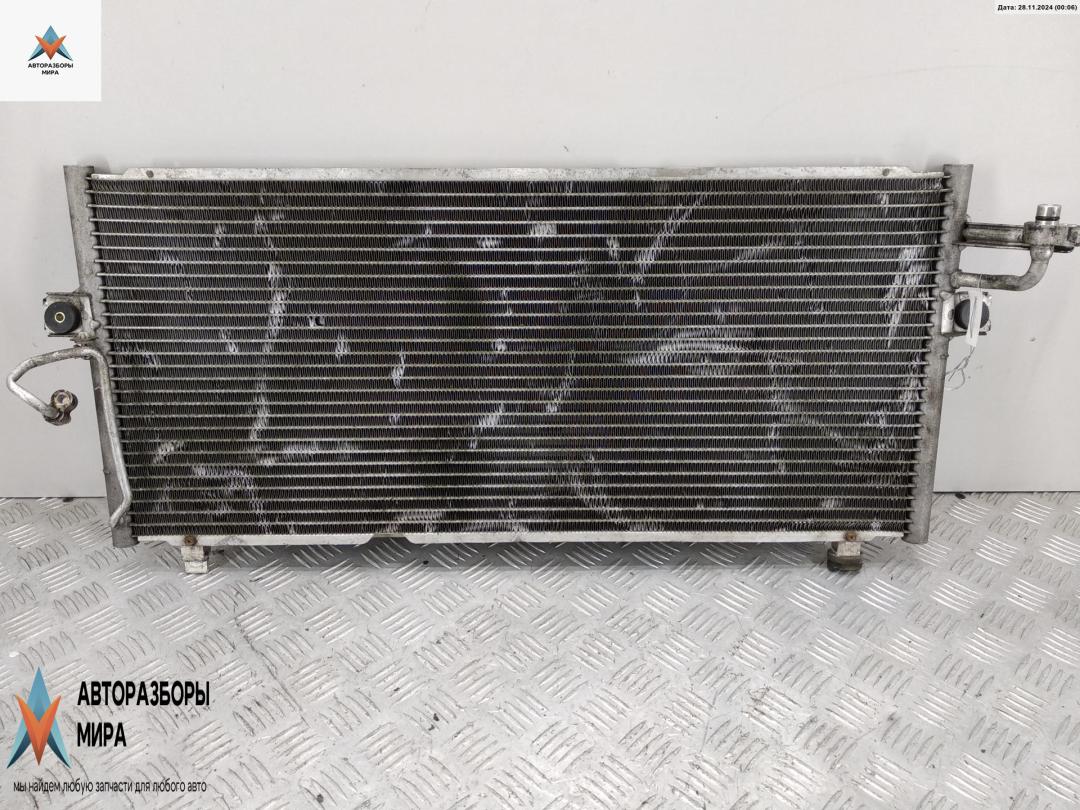 радиатор кондиционера Nissan Primera P11 2000, 2.0 л., бензин, МКПП, синий, хетчбэк 5 дв., 92110-9F515 - фото №1