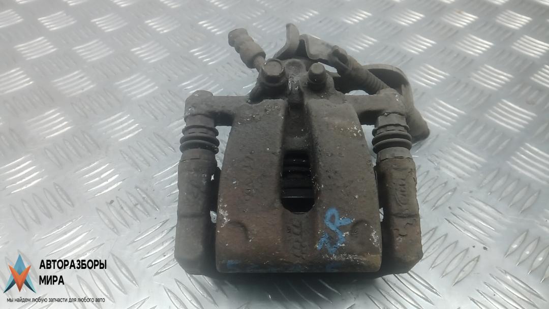 суппорт задний правый Kia Ceed 2 поколение 2013, 1.4 л., дизель, МКПП, универсал, 58400A2300, 58311A2A30 - фото №1