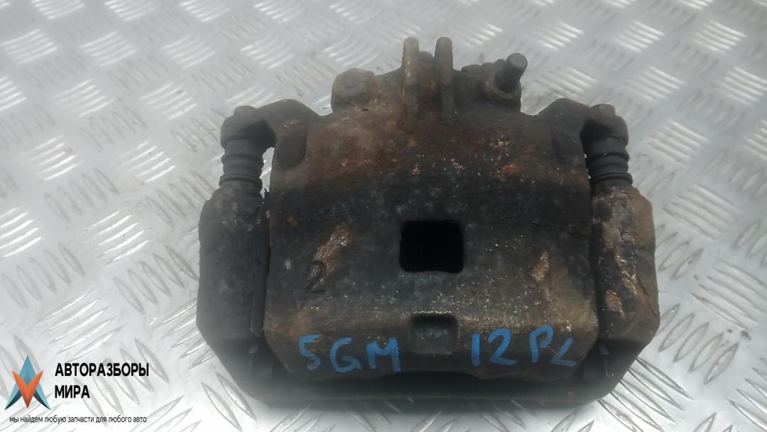 суппорт передний левый Nissan NV200 1 поколение 2012, 1.5 л., дизель, МКПП, 41011JX50B - фото №1