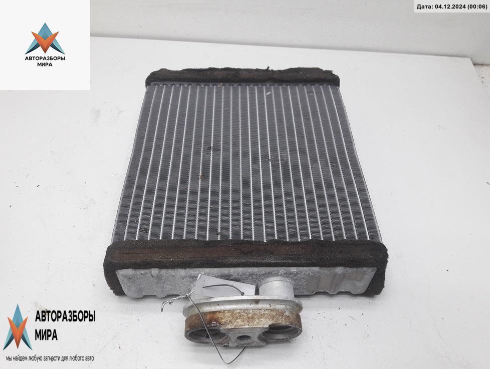 радиатор отопителя (печки) Skoda Roomster 1 поколение 2007, 1.4 л., дизель, МКПП, серый, фургон - фото №1