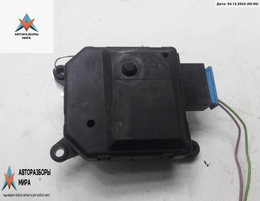 моторчик заслонки печки Skoda Roomster 1 поколение 2007, 1.4 л., дизель, МКПП, серый, фургон - фото №1