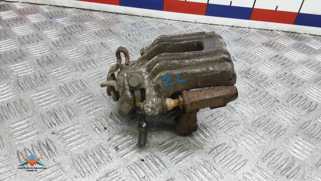 суппорт задний левый Skoda Rapid 1 поколение 2013, 1.6 л., дизель, МКПП, хетчбэк 5 дв., 6R0615423 - фото №1