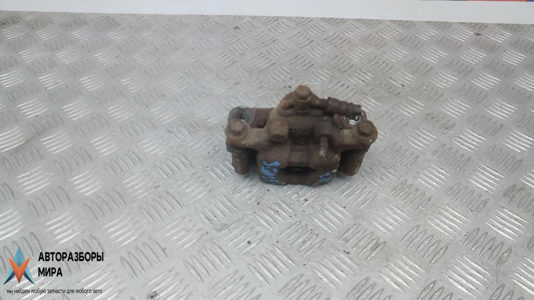 суппорт задний правый Nissan Juke YF15 2010, 1.5 л., дизель, МКПП, внедорожник 5 дв., 440011KD0A - фото №1