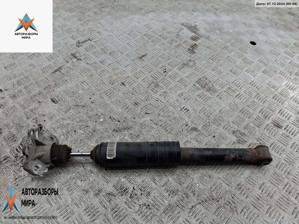 амортизатор задний левый Opel Corsa D 2009, 1.2 л., бензин, МКПП, синий, хетчбэк 5 дв. - фото №1