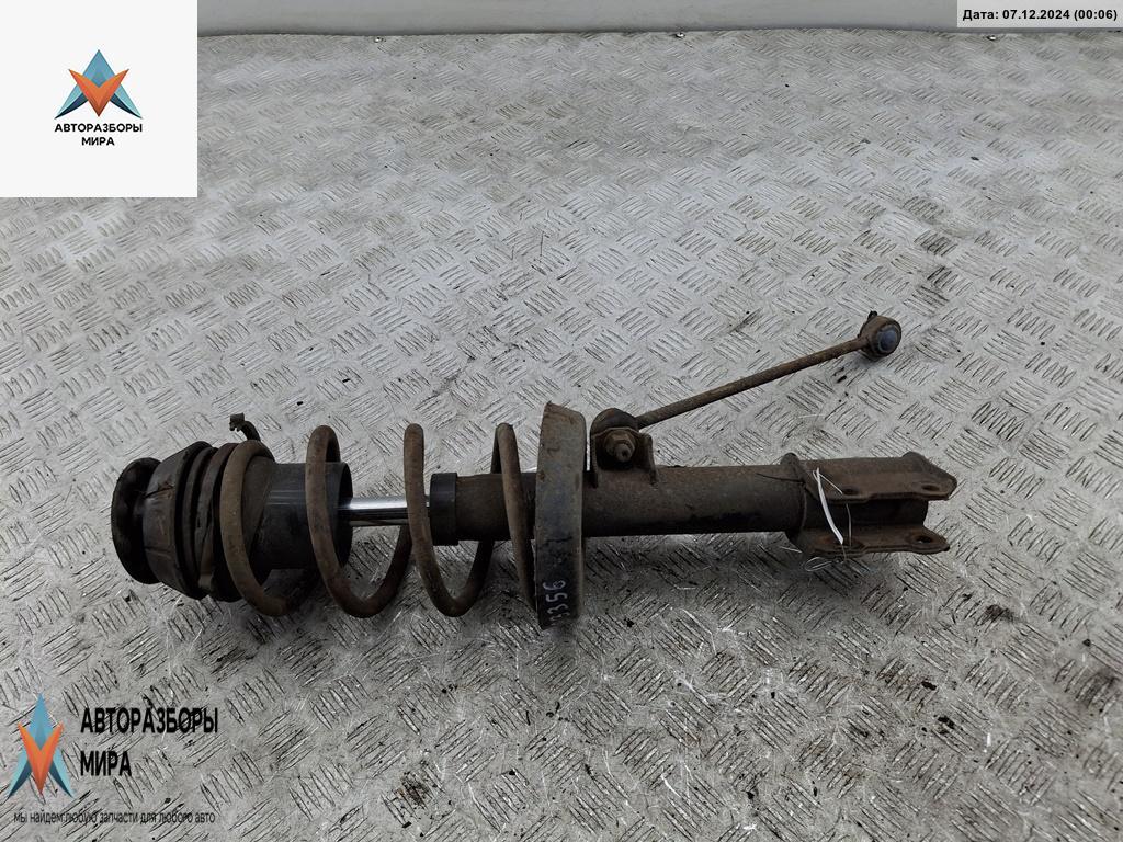 стойка передняя Opel Zafira 1 поколение (A) 1999, 1.8 л., бензин, МКПП, красный, минивэн - фото №1