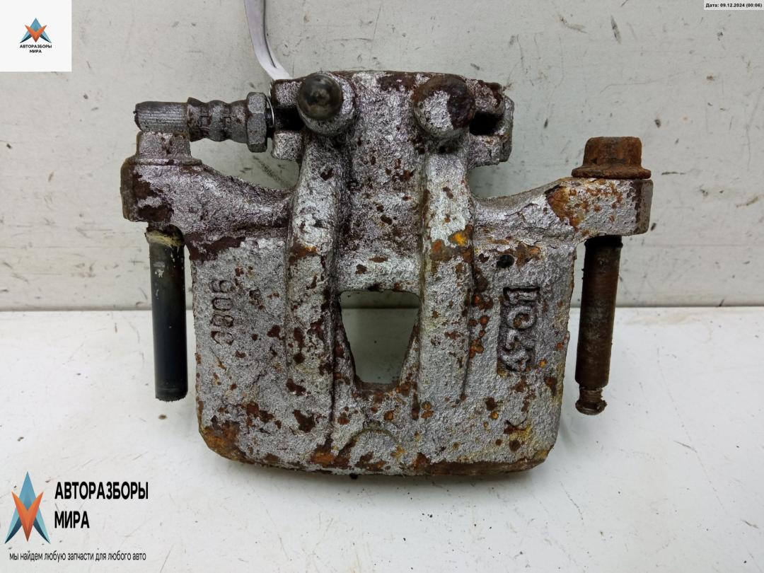 суппорт задний левый Mitsubishi Grandis 1 поколение 2004, 2.4 л., бензин, МКПП, чёрный, минивэн - фото №1