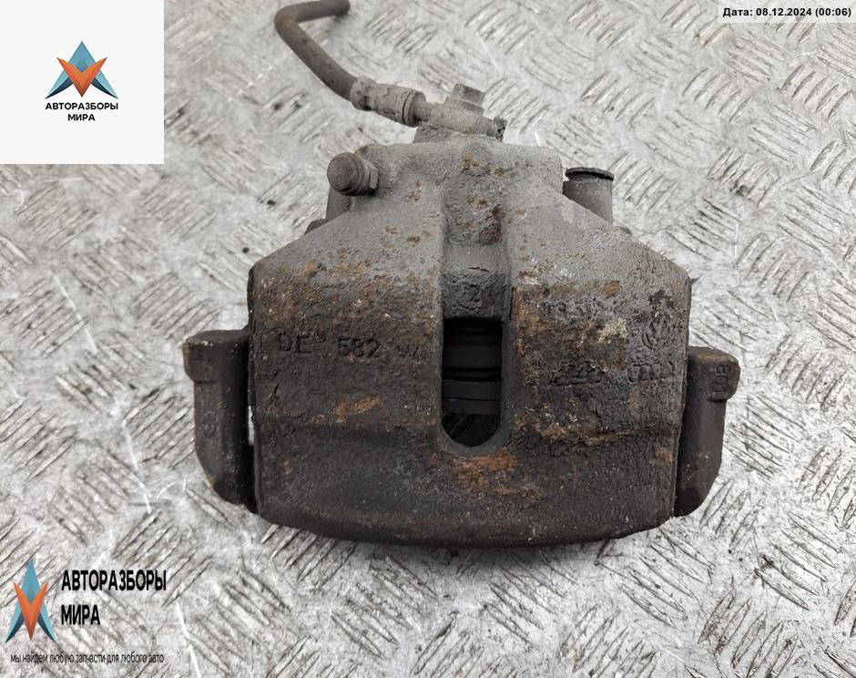 суппорт передний правый Volkswagen Touran 1 поколение 2004, 1.6 л., бензин, МКПП, серый, минивэн - фото №1