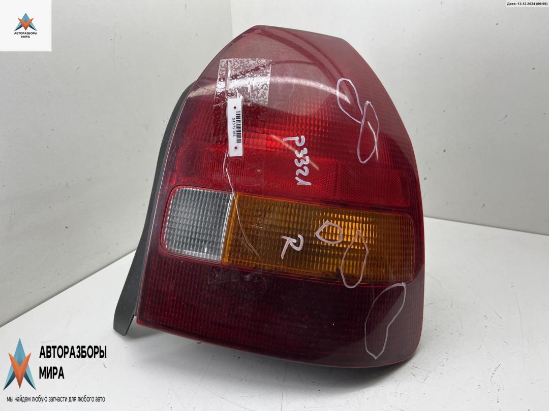 фонарь задний правый Honda Civic 6 поколение 1996, 1.4 л., бензин, МКПП, чёрный, хетчбэк 3 дв. - фото №1