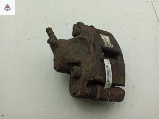 суппорт передний левый Dacia (Renault) Sandero I 2009, 1.2 л., бензин, МКПП, белый, хетчбэк 5 дв.