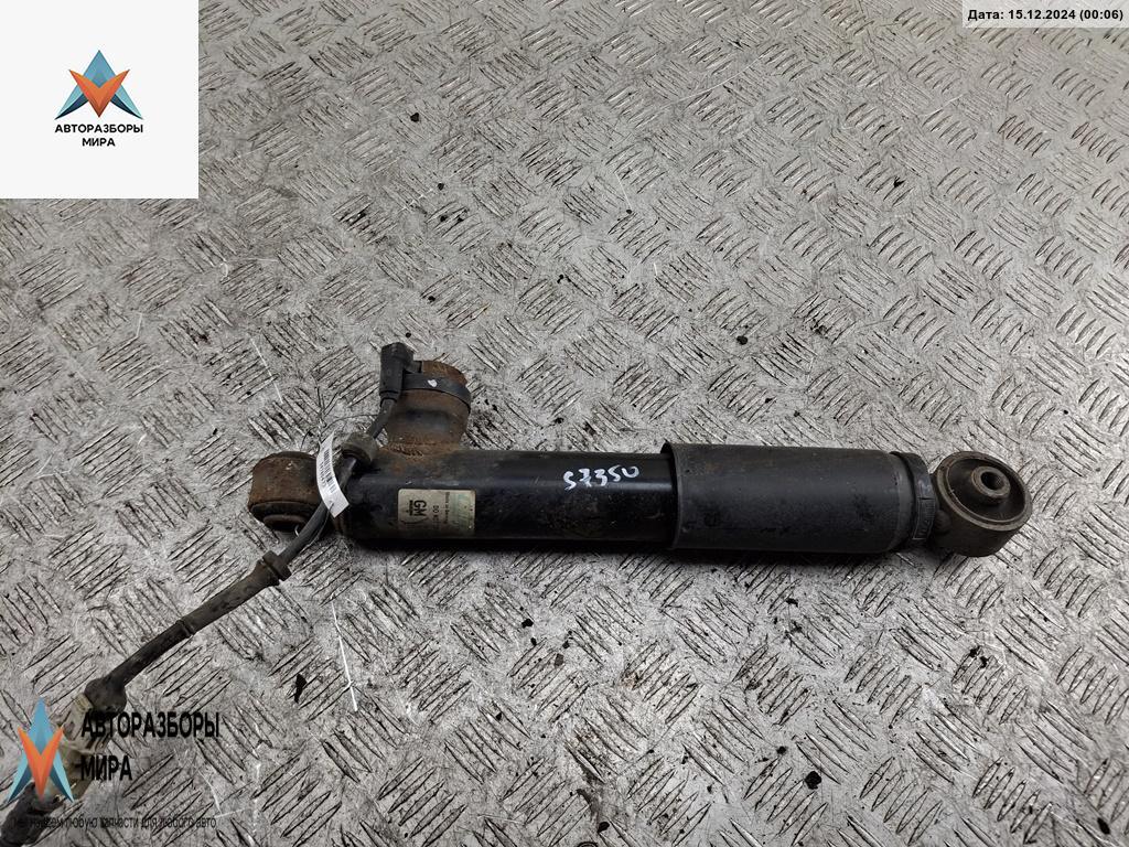 амортизатор задний левый Opel Astra H 2004, 2.0 л., бензин, МКПП, зелёный, универсал, 13191633 - фото №1