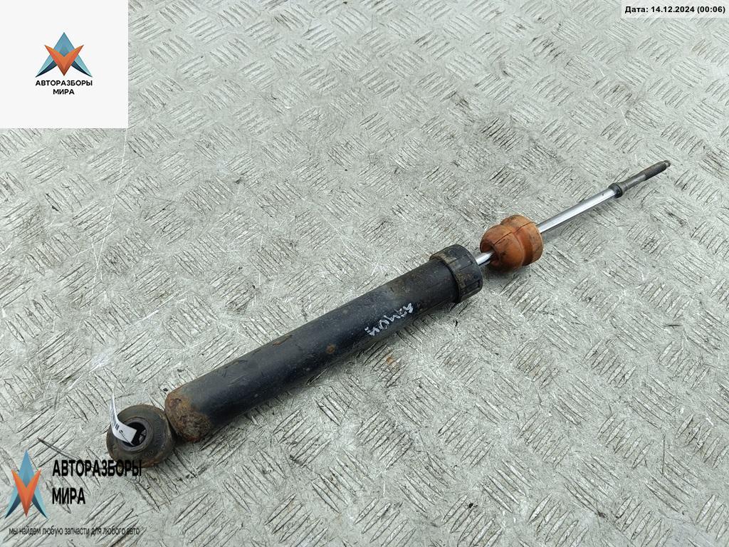 амортизатор задний левый Opel Corsa C 2000, 1.4 л., бензин, АКПП, серый, хетчбэк 3 дв. - фото №1