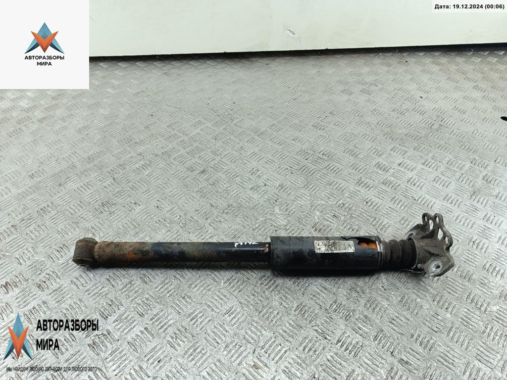 амортизатор задний левый Fiat Grande Punto 1 поколение 2007, 1.4 л., бензин, МКПП, жёлтый, хетчбэк 3 дв. - фото №1