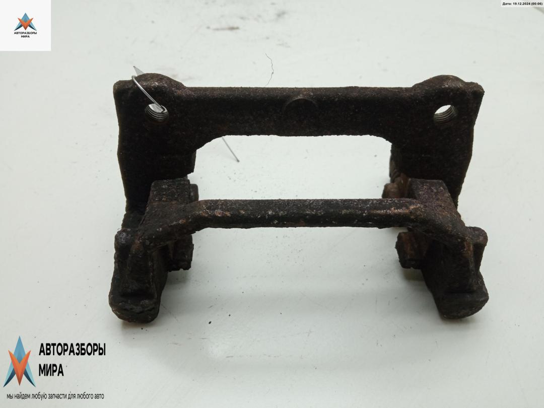 скоба суппорта Fiat Grande Punto 1 поколение 2007, 1.4 л., бензин, МКПП, жёлтый, хетчбэк 3 дв. - фото №1