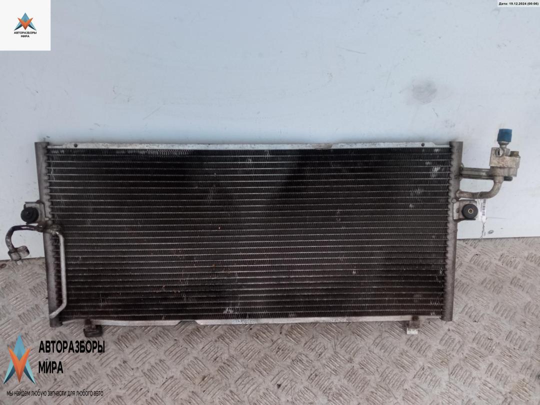 радиатор кондиционера Nissan Primera P11 2000, 1.8 л., бензин, МКПП, серый, хетчбэк 5 дв. - фото №1