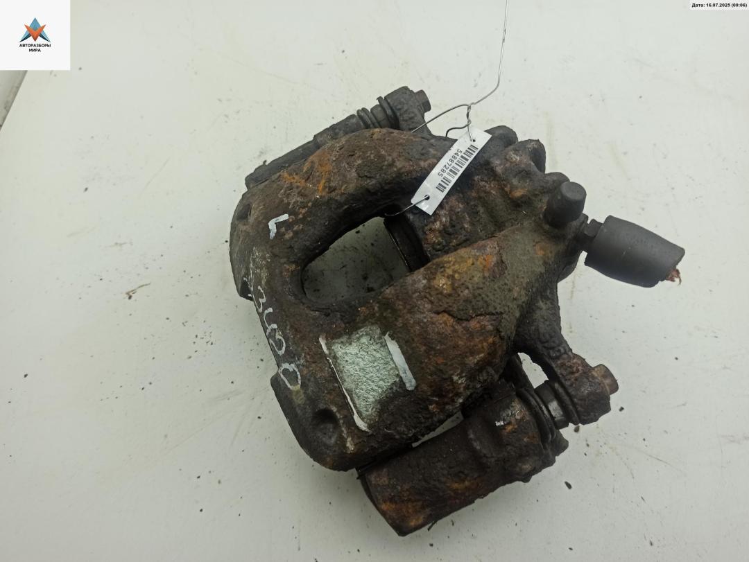 суппорт передний левый Peugeot 308 T7 2009, 1.6 л., бензин, МКПП, белый, хетчбэк 5 дв. - фото №1