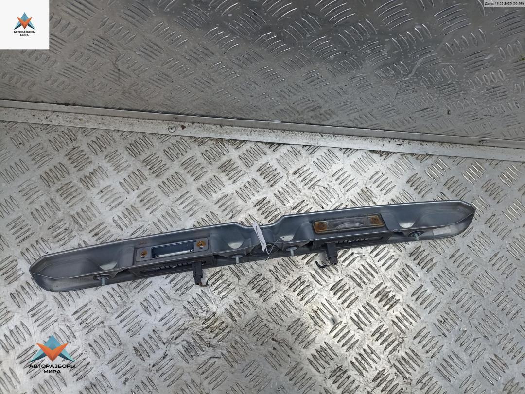 накладка подсветки номера Opel Astra G 2001, 2.0 л., дизель, МКПП, серый, универсал - фото №1