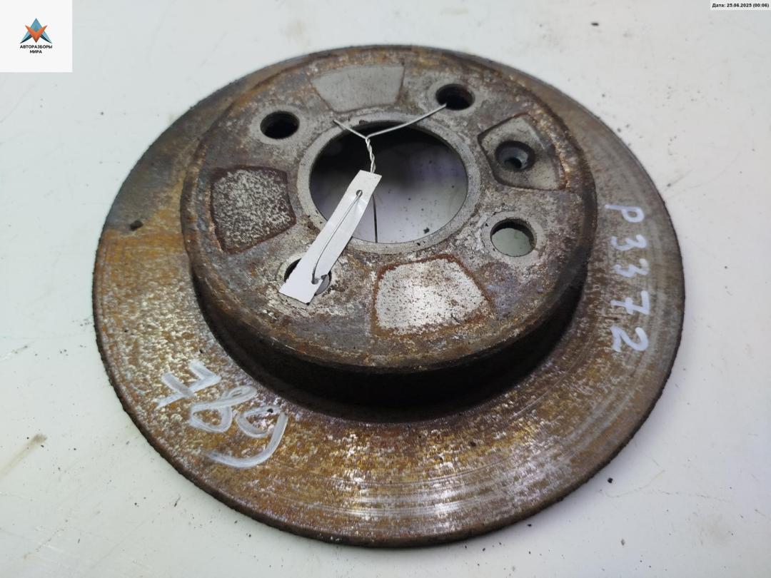 диск тормозной задний Opel Astra G 2004, 1.7 л., дизель, МКПП, синий, универсал - фото №1