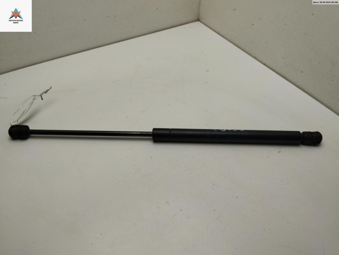 амортизатор крышки багажника (3-5 двери) Ford Ka 1 поколение 2001, 1.3 л., бензин, МКПП, серый, хетчбэк 3 дв., 97KGB406A10AA - фото №1