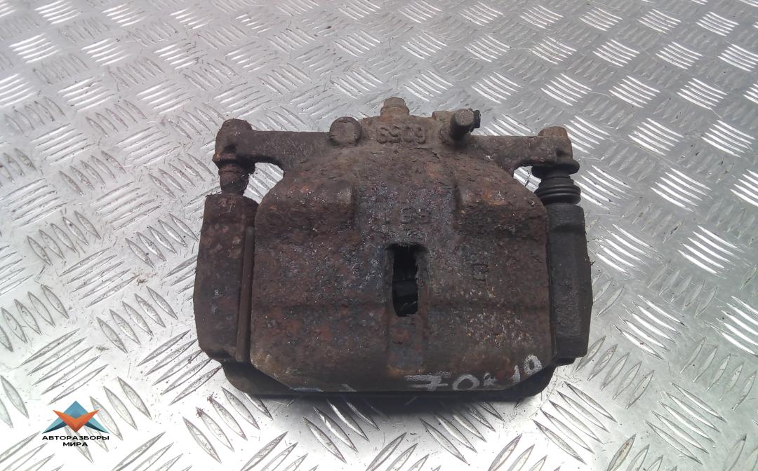 суппорт передний левый Nissan Qashqai 1 поколение 2009, 1.6 л., бензин, МКПП, внедорожник 5 дв., 41011JD00A - фото №1