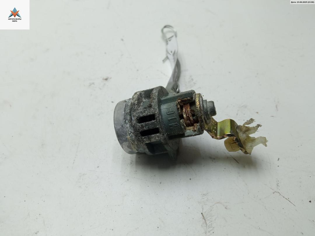 Личинка замка багажника Mitsubishi Lancer 9 поколение 2003, 1.6 л., бензин, АКПП, серый, универсал - фото №1