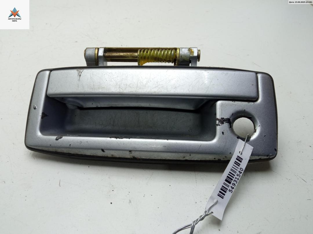 ручка крышки багажника Mitsubishi Lancer 9 поколение 2003, серый, универсал, MN181224 - фото №1