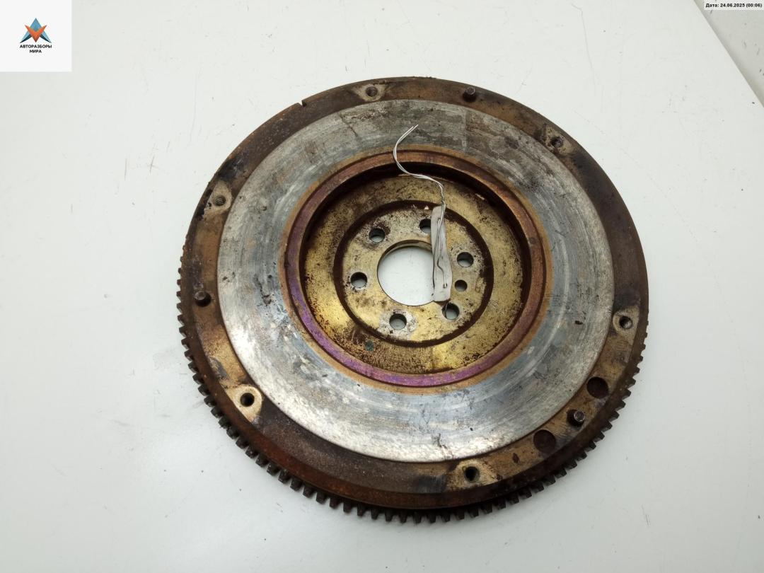 маховик Fiat Bravo 2 поколение 2009, 1.4 л., бензин, МКПП, серый, хетчбэк 5 дв., 46470371 - фото №1