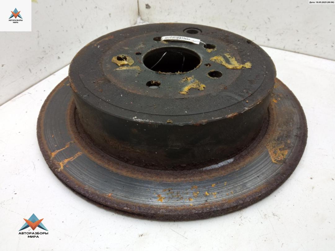 диск тормозной задний Subaru Forester 3 поколение (SH) 2010, 2.0 л., дизель, МКПП, чёрный, внедорожник 5 дв. - фото №1