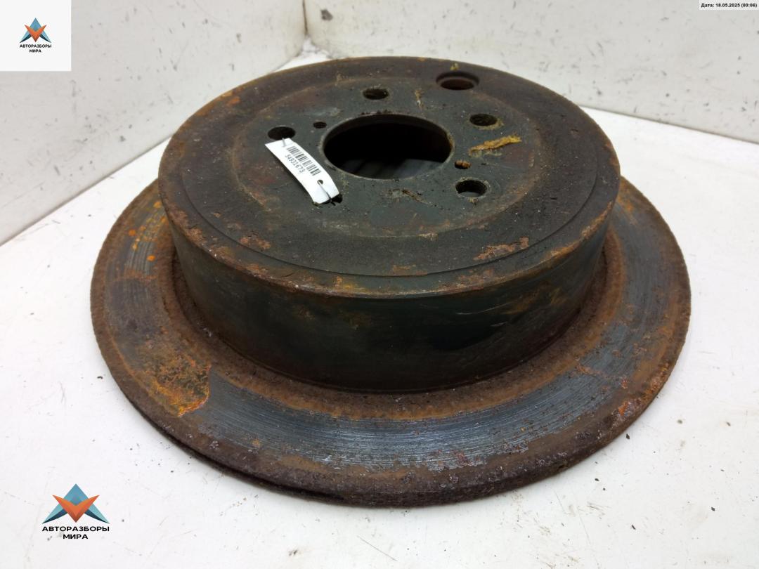 диск тормозной задний Subaru Forester 3 поколение (SH) 2010, 2.0 л., дизель, МКПП, чёрный, внедорожник 5 дв. - фото №1