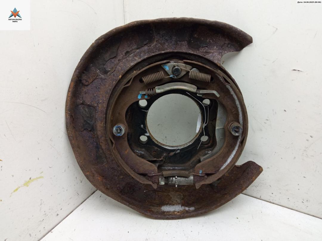 защитный кожух тормозного механизма Subaru Forester 3 поколение (SH) 2010, 2.0 л., дизель, МКПП, чёрный, внедорожник 5 дв. - фото №1