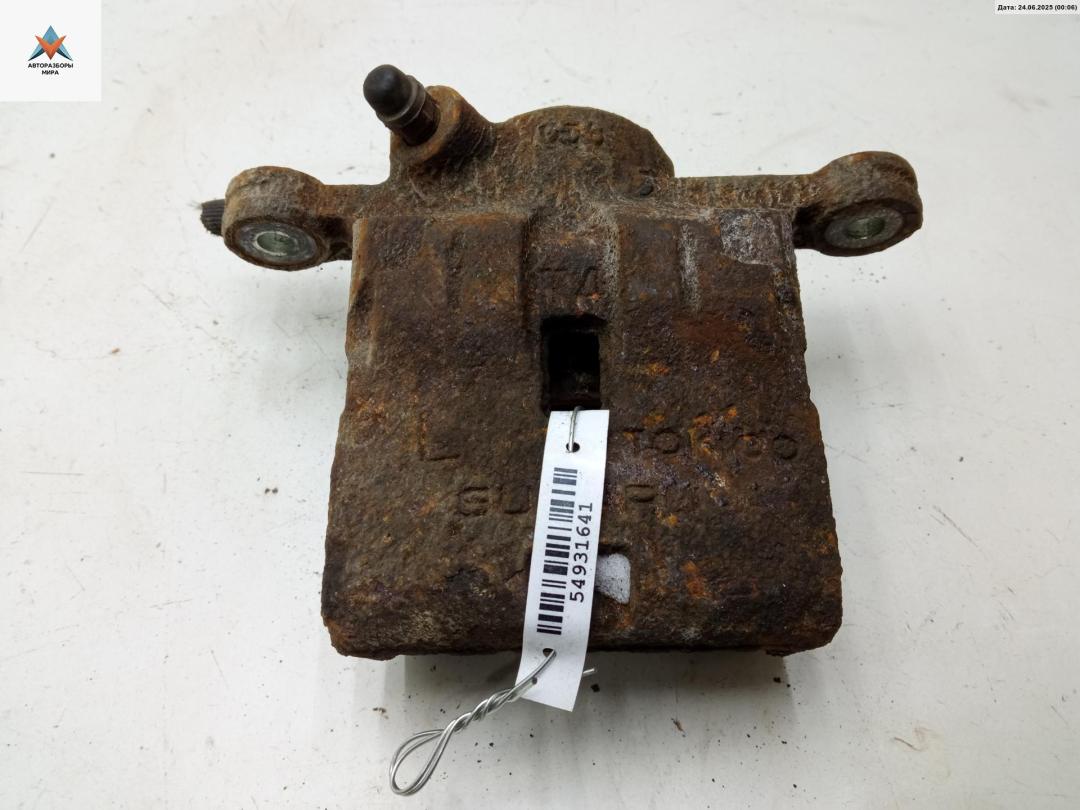 суппорт задний левый Subaru Forester 3 поколение (SH) 2010, 2.0 л., дизель, МКПП, чёрный, внедорожник 5 дв. - фото №1