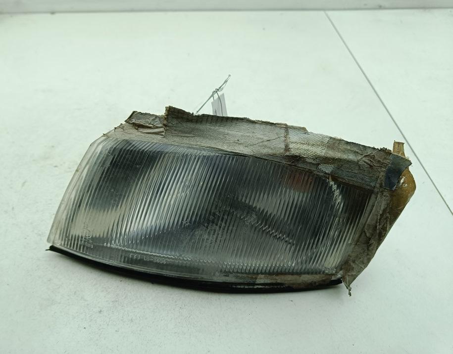 Поворотник (указатель поворота) левый Opel Vectra B 1998, 1.6 л., бензин, МКПП, красный, седан - фото №1