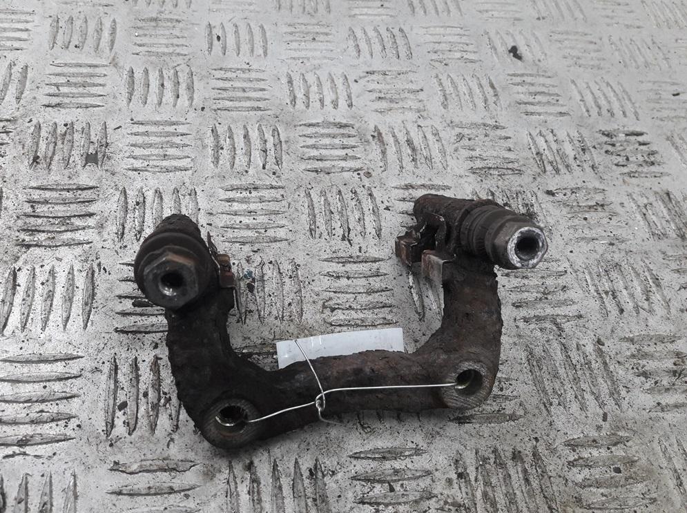 скоба суппорта Volkswagen Bora 2000, 1.6 л., бензин, МКПП, чёрный, седан