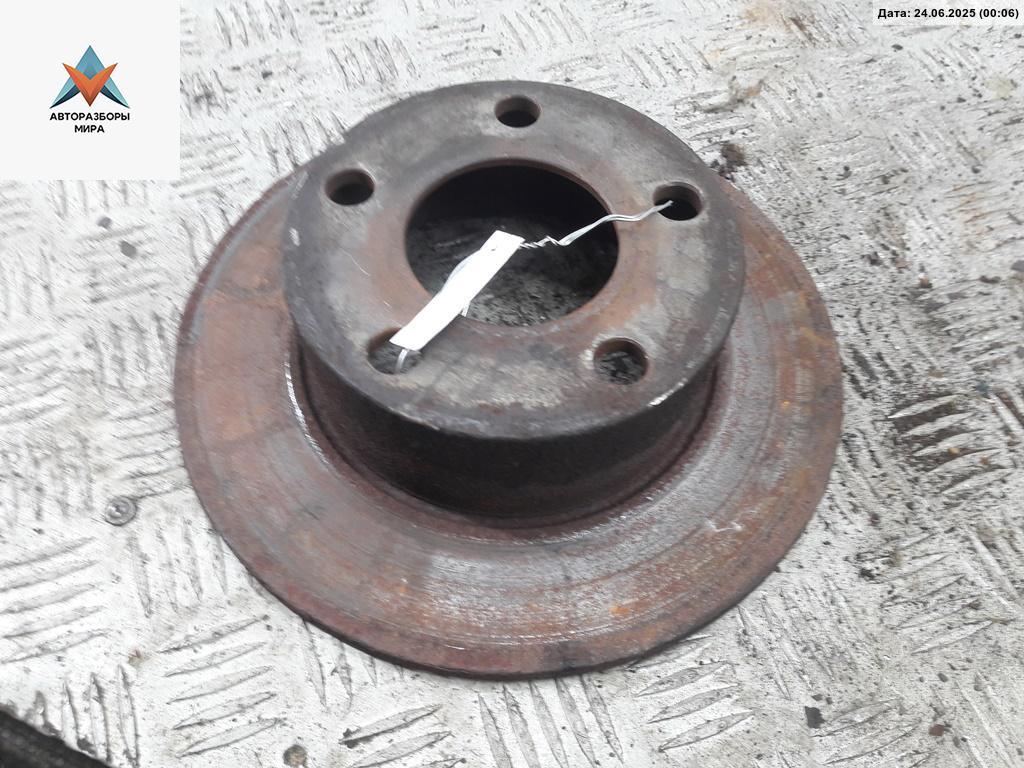 диск тормозной задний Volkswagen Passat B5 1998, 1.8 л., бензин, МКПП, серый, универсал - фото №1