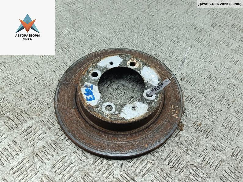 диск тормозной задний Mitsubishi Space Star 1 поколение 2001, 1.3 л., бензин, МКПП, серый, минивэн - фото №1