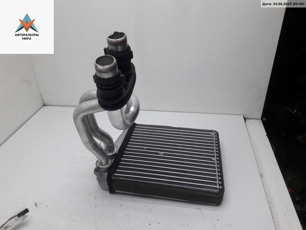 радиатор отопителя (печки) Volkswagen Golf 5 поколение 2006, 2.0 л., дизель, АКПП, красный, хетчбэк 5 дв., 1K0819031A - фото №1