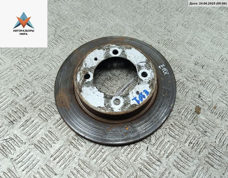 диск тормозной задний Mitsubishi Space Star 1 поколение 2001, 1.3 л., бензин, МКПП, серый, минивэн - фото №1