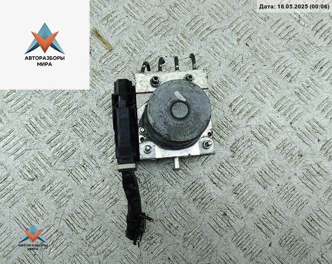 блок ABS Subaru Forester 3 поколение (SH) 2010, 2.0 л., дизель, МКПП, чёрный, внедорожник 5 дв., 27536SC021 - фото №1