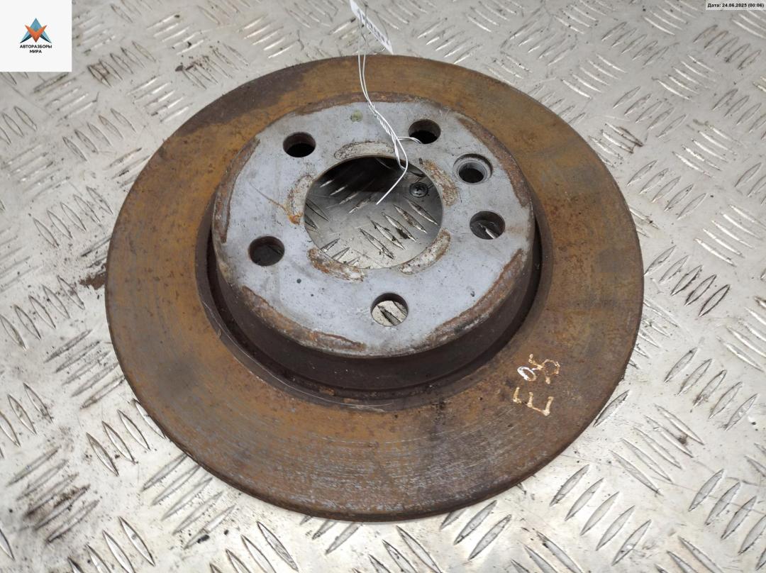 диск тормозной задний Volkswagen Transporter T4 2000, 1.9 л., дизель, МКПП, красный, микроавтобус - фото №1