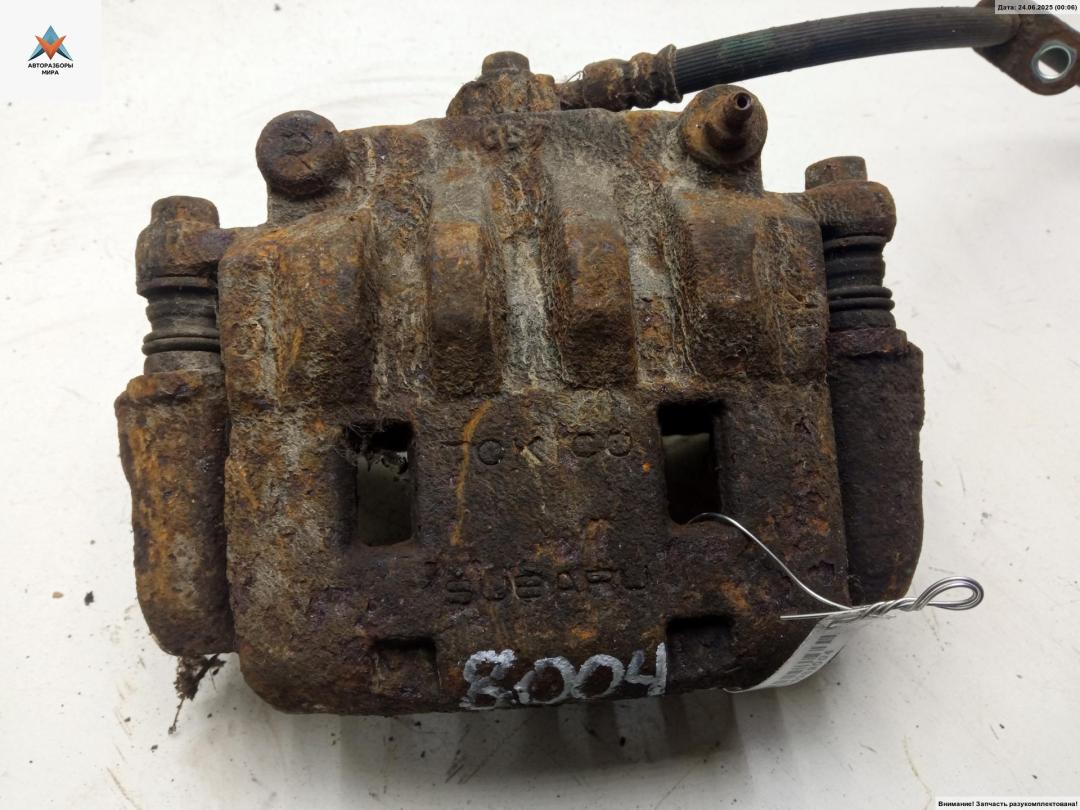 суппорт передний правый Subaru Forester 3 поколение (SH) 2010, 2.0 л., дизель, МКПП, чёрный, внедорожник 5 дв. - фото №1