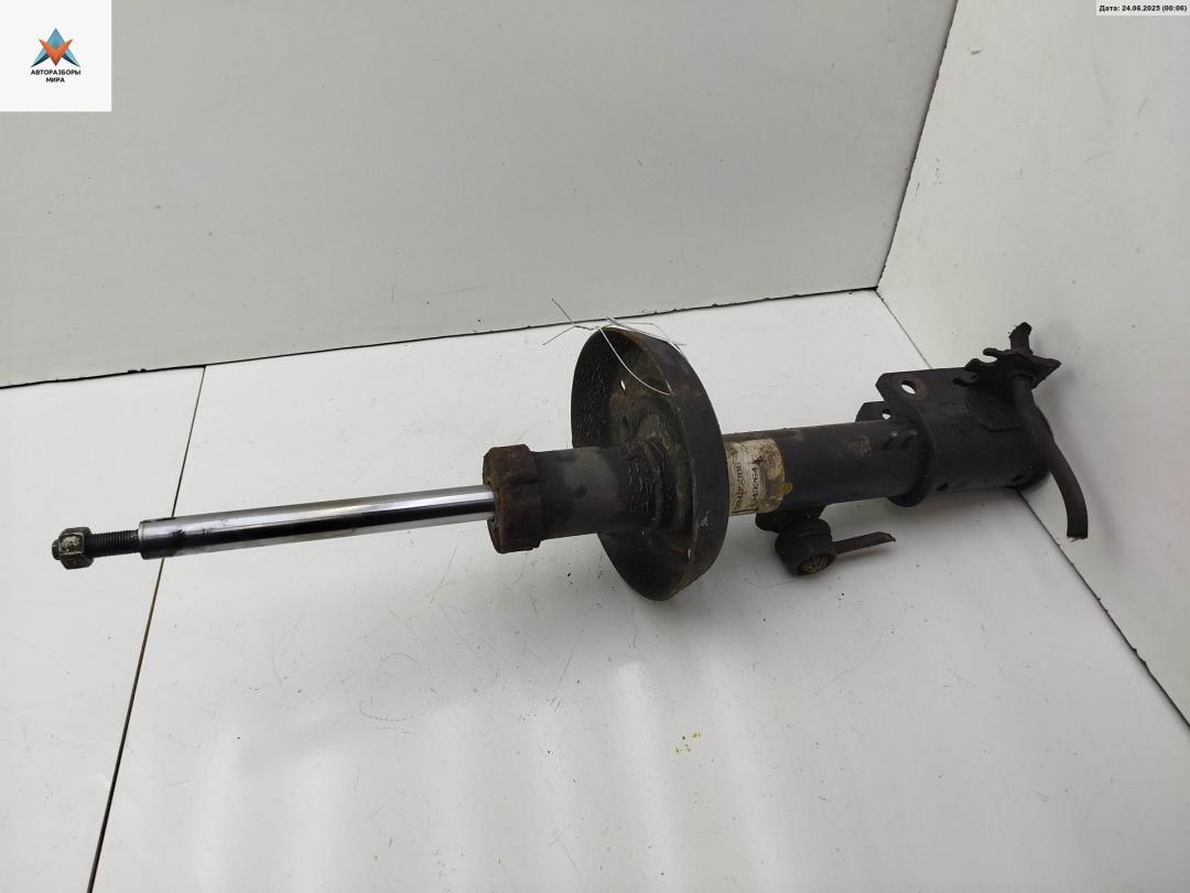 амортизатор передний левый Opel Vectra B 1998, 1.6 л., бензин, МКПП, красный, седан, 90495386 - фото №1