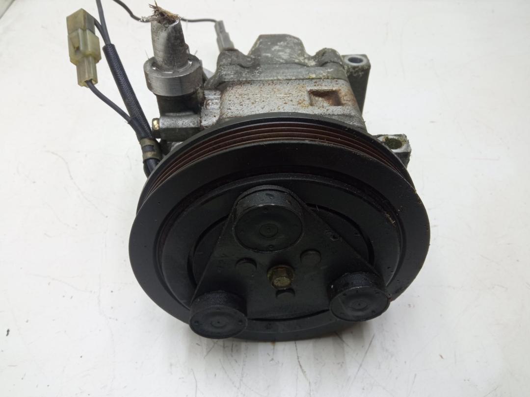 компрессор кондиционера Mazda 323 BJ 1999, 1.5 л., бензин, H12A1AA4DL - фото №1