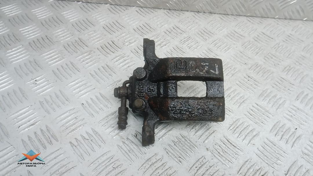 суппорт задний правый Nissan Qashqai 2 поколение 2013, 1.5 л., дизель, МКПП, внедорожник 5 дв., 44001JY00A - фото №1