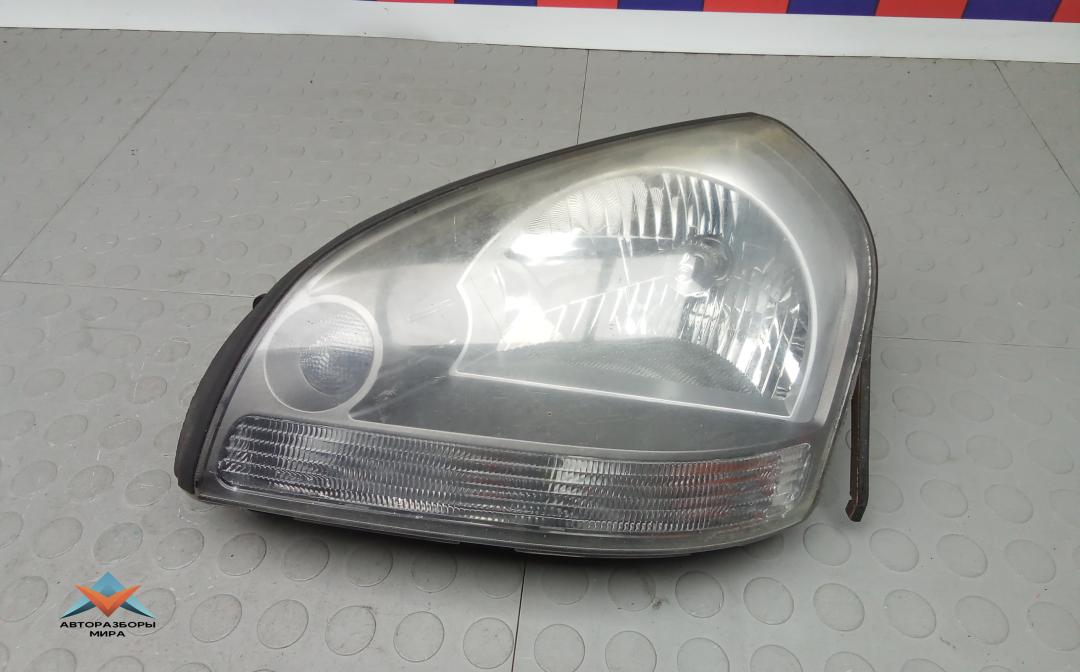 фара левая Hyundai Tucson 1 поколение 2006, 2.0 л., дизель, МКПП, внедорожник 5 дв., 921032E040 - фото №1