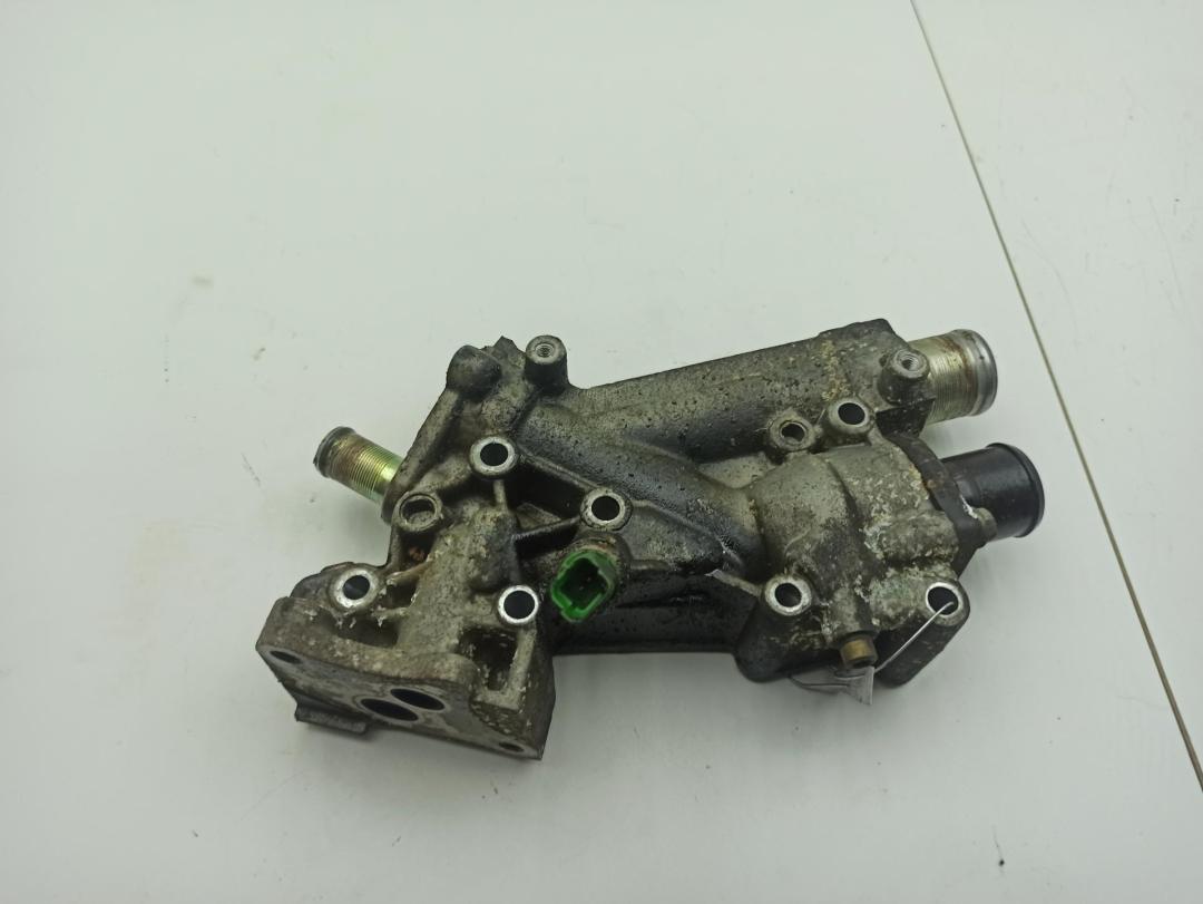 корпус термостата Peugeot 307 2003, 2.0 л., бензин, МКПП, зелёный, универсал, 9653298580