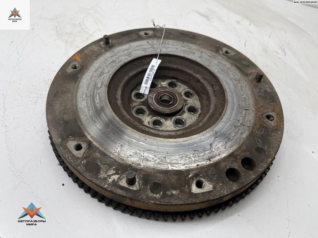 маховик Suzuki Liana 1 поколение 2002, 1.6 л., бензин, МКПП, серый, хетчбэк 5 дв. - фото №1