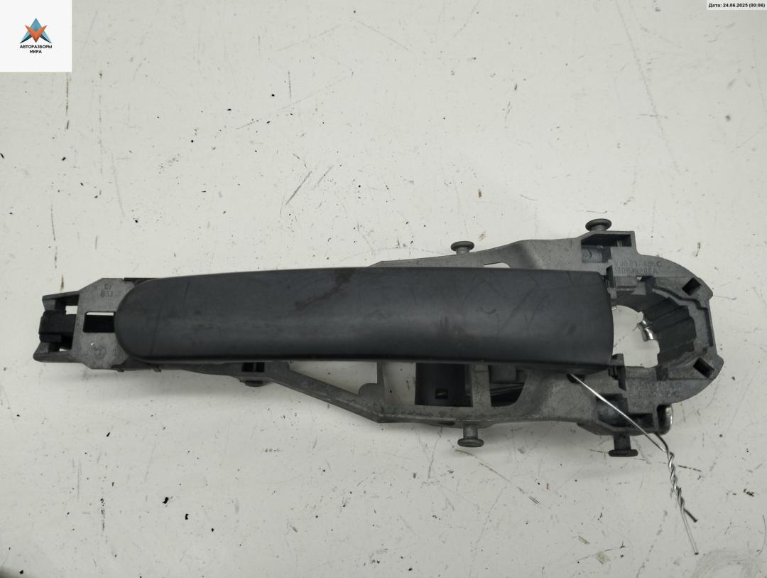 ручка наружная задняя левая Skoda Fabia 2 поколение (5J) 2009, 1.2 л., бензин, МКПП, серый, универсал, 5J0837885A - фото №1