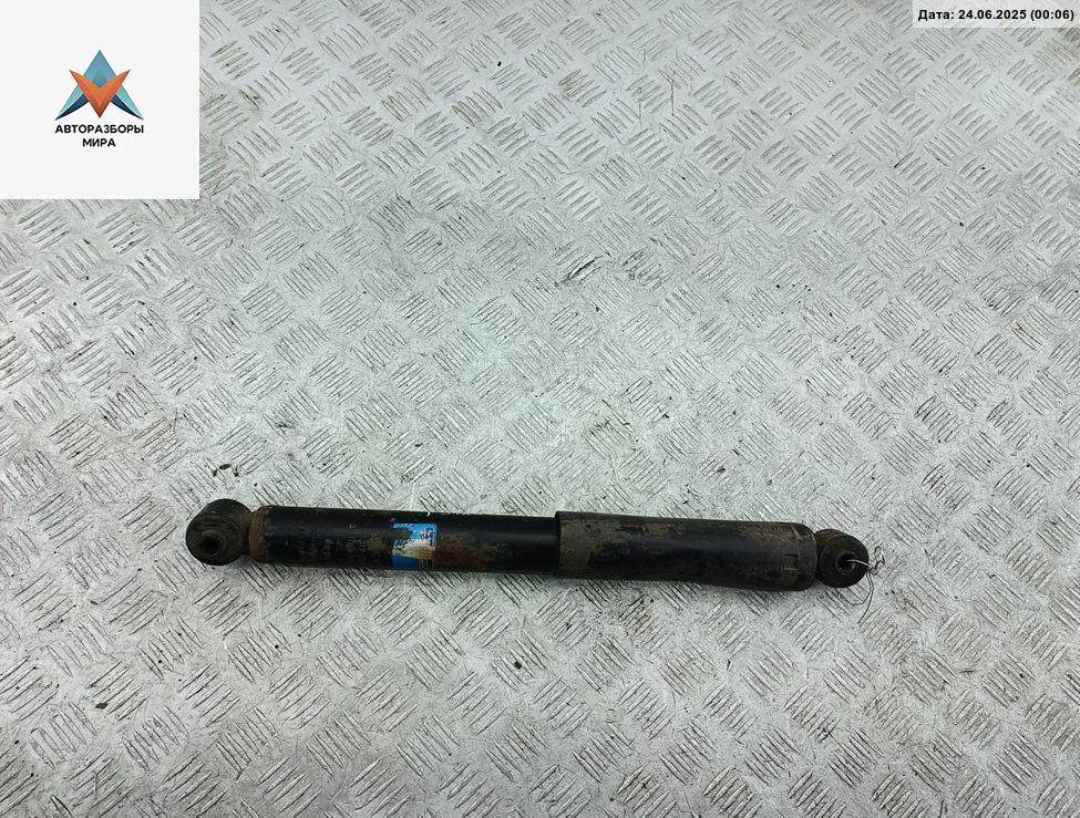 амортизатор задний левый Fiat Stilo 1 поколение 2003, 1.6 л., бензин, МКПП, синий, универсал, 312125 - фото №1