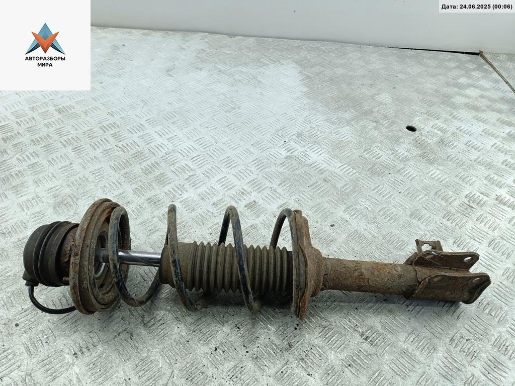 стойка передняя Suzuki Baleno 1 поколение 1995, 1.6 л., бензин, МКПП, зелёный, седан - фото №1