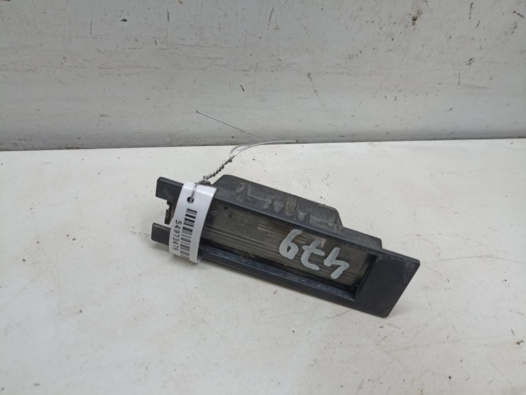 подсветка номера Opel Zafira 2 поколение (B) 2005, 1.9 л., дизель, МКПП, чёрный, минивэн, 09164143 - фото №1